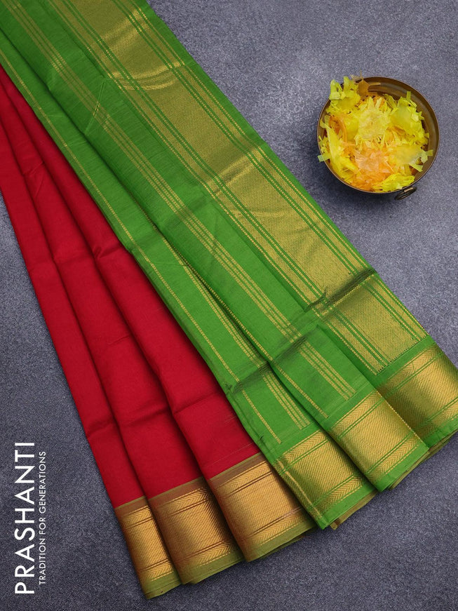 Silk cotton saree red and green with plain body and zari woven border