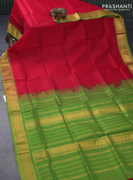 Silk cotton saree red and green with plain body and zari woven border