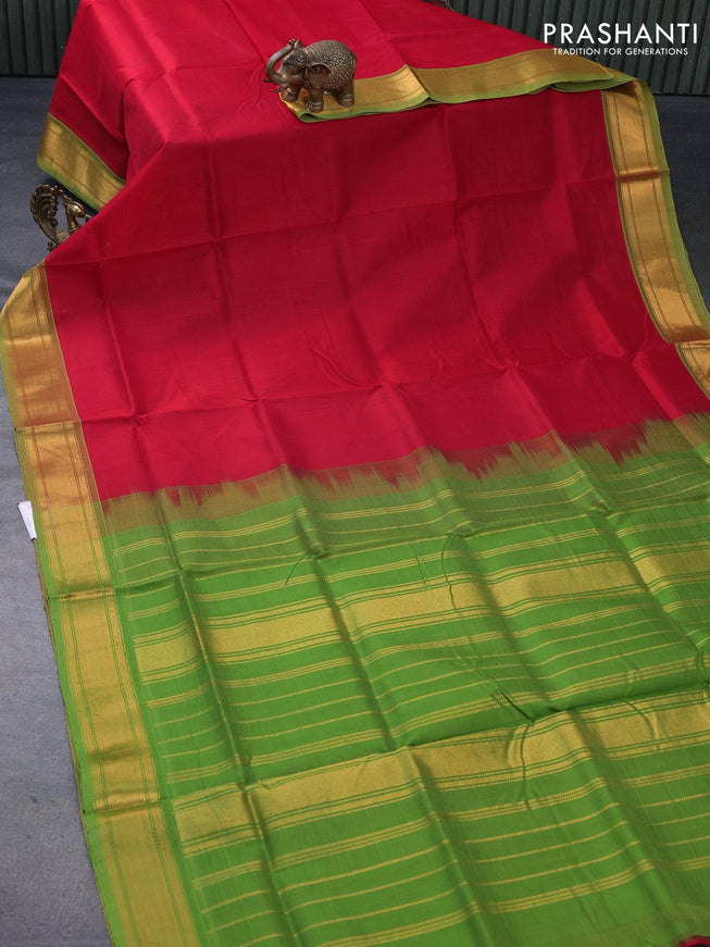 Silk cotton saree red and green with plain body and zari woven border