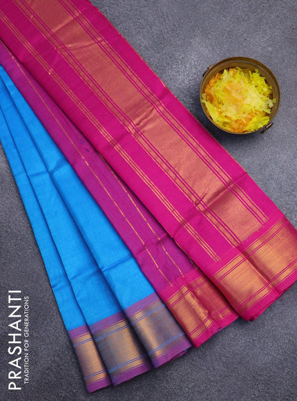 Silk cotton saree blue and pink with plain body and zari woven border