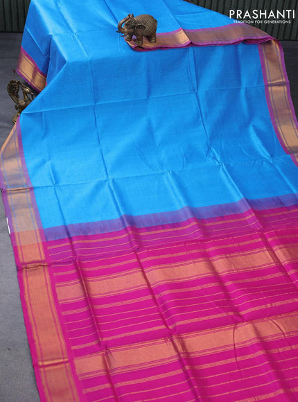 Silk cotton saree blue and pink with plain body and zari woven border