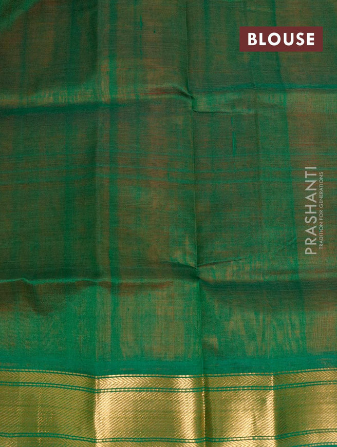 Silk cotton saree orange and green with plain body and zari woven border