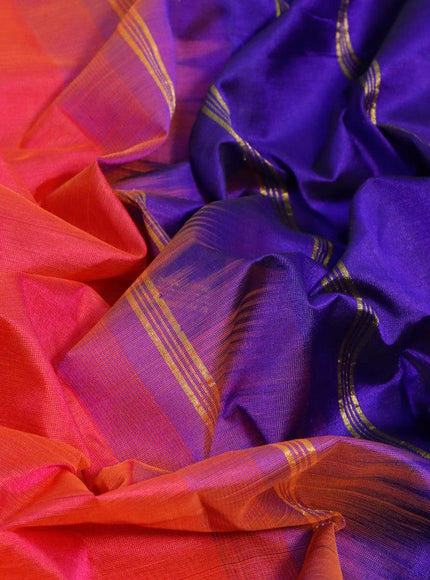 Silk cotton saree dual shade of pinkish orange and blue with plain body and small zari woven border