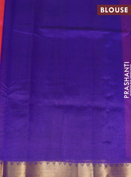 Silk cotton saree dual shade of pinkish orange and blue with plain body and small zari woven border