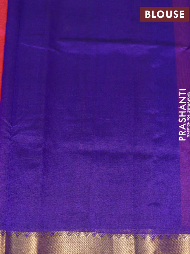 Silk cotton saree dual shade of pinkish orange and blue with plain body and small zari woven border