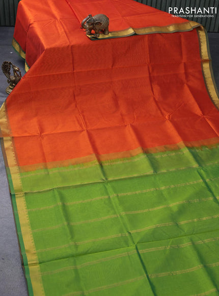 Silk cotton saree rustic orange and green with plain body and small zari woven border