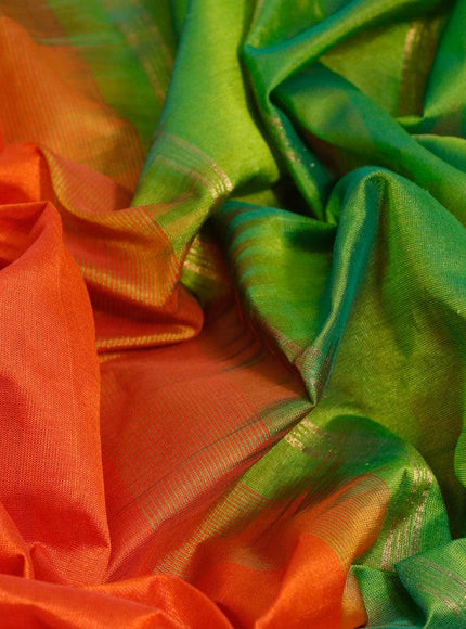 Silk cotton saree rustic orange and green with plain body and small zari woven border