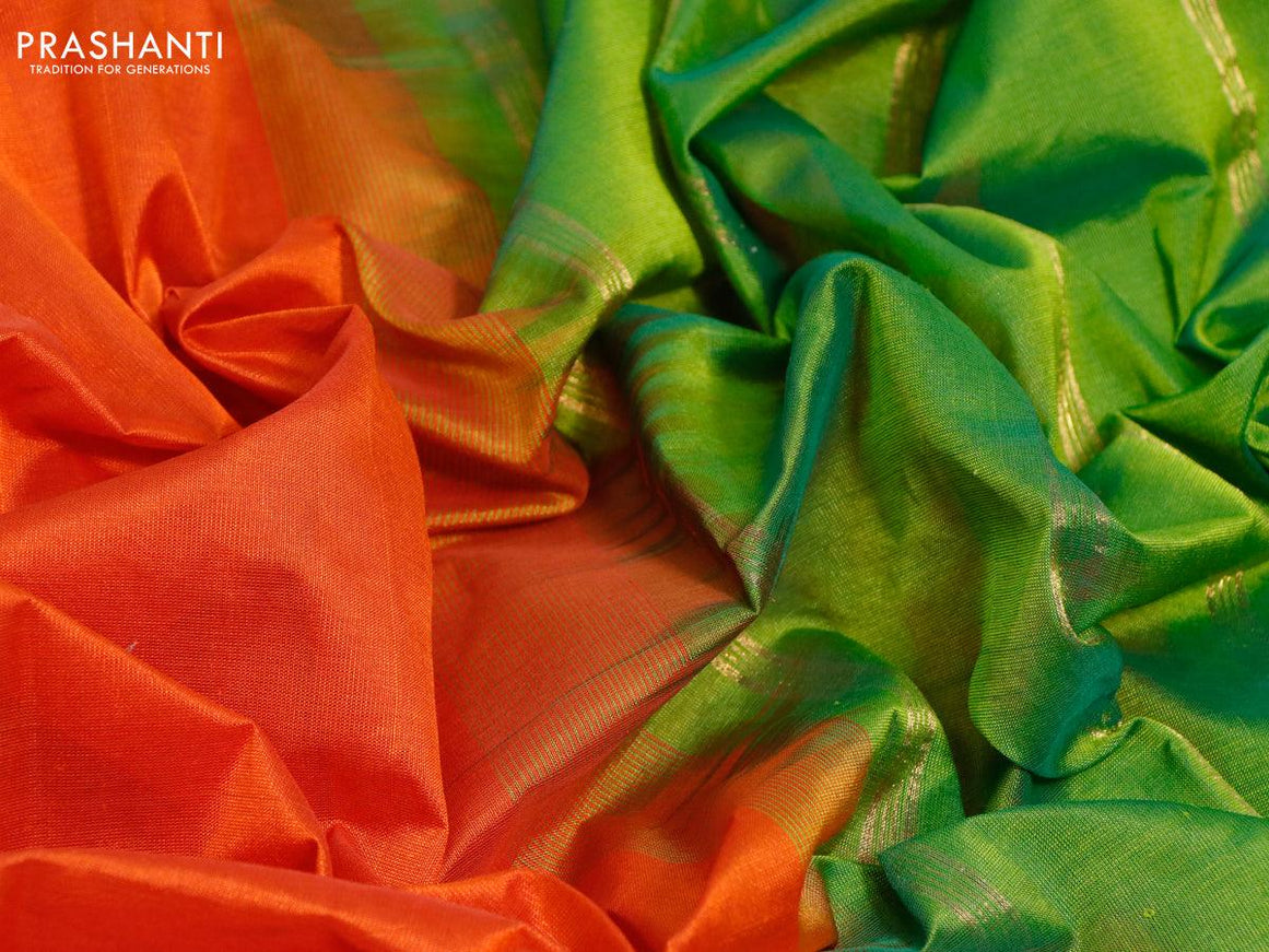 Silk cotton saree rustic orange and green with plain body and small zari woven border