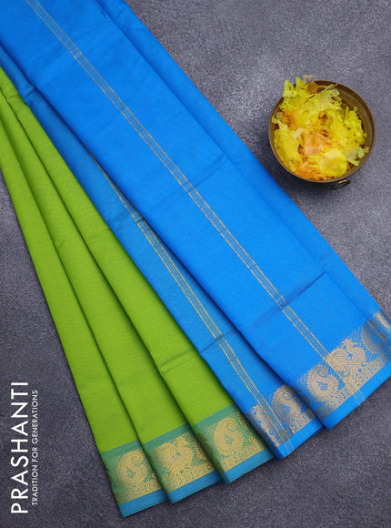 Silk cotton saree parrot green and cs blue with plain body and annam & paisley zari woven border