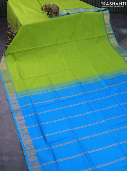 Silk cotton saree parrot green and cs blue with plain body and annam & paisley zari woven border