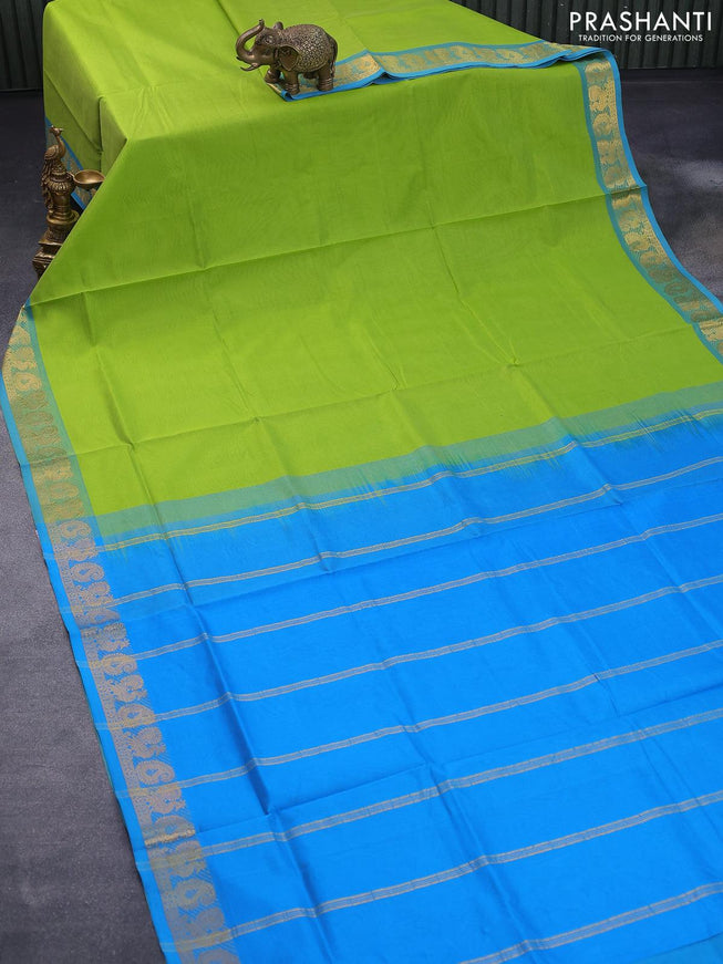 Silk cotton saree parrot green and cs blue with plain body and annam & paisley zari woven border