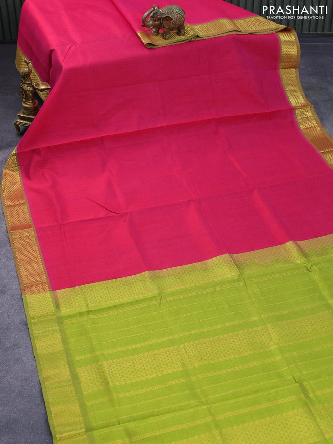 Silk cotton saree pink and lime green with plain body and zari woven border