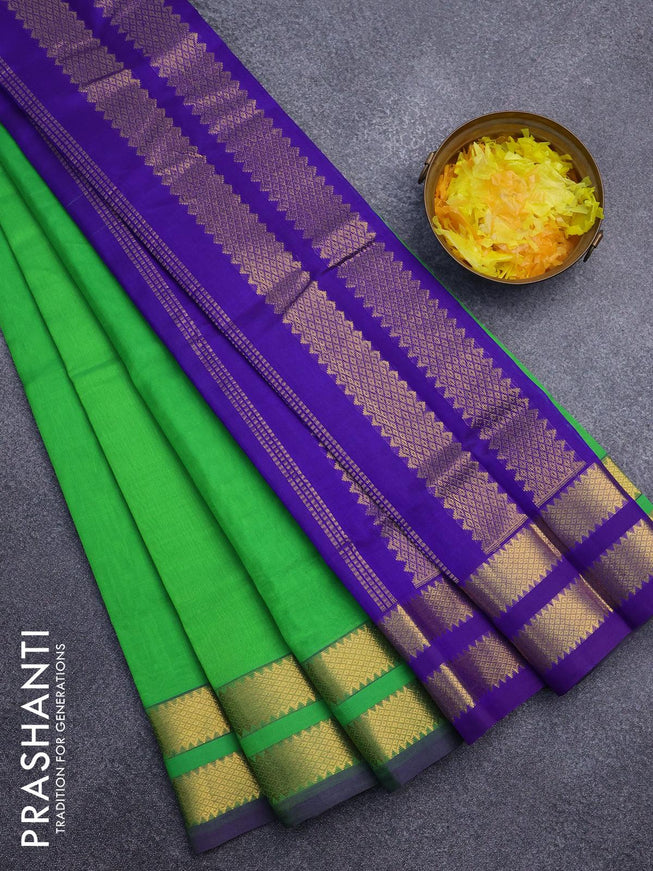 Silk cotton saree light green and violet with plain body and rettapet zari woven border