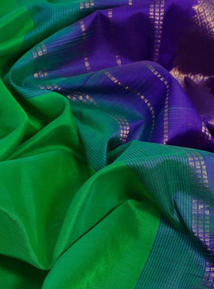 Silk cotton saree light green and violet with plain body and rettapet zari woven border