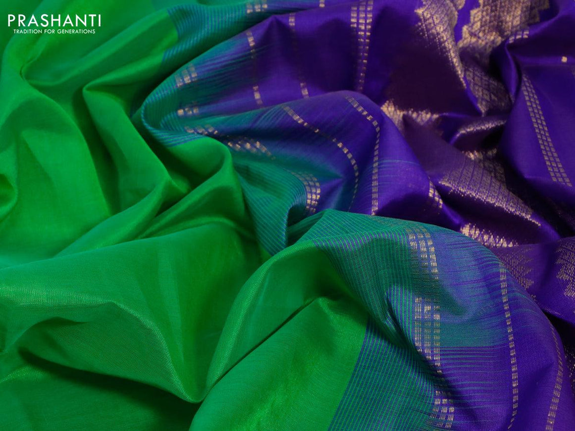 Silk cotton saree light green and violet with plain body and rettapet zari woven border