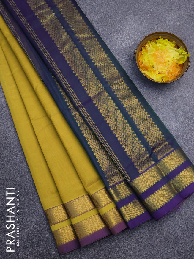 Silk cotton saree yellow and dual shade of bluish green with plain body and rettapet zari woven border