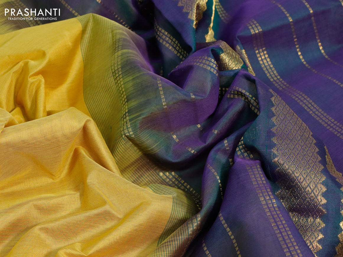 Silk cotton saree yellow and dual shade of bluish green with plain body and rettapet zari woven border