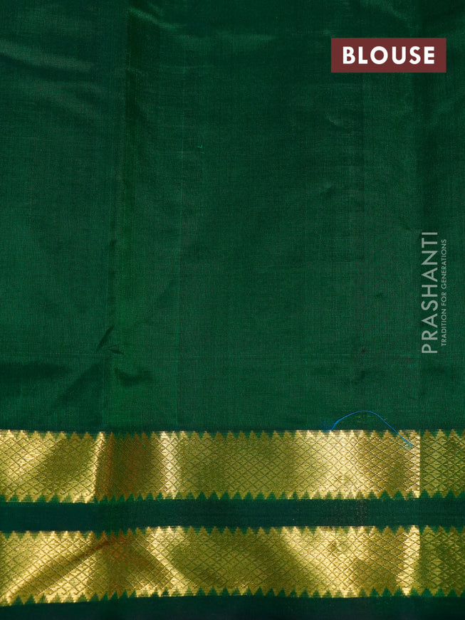 Silk cotton saree orange and green with plain body and rettapet zari woven border