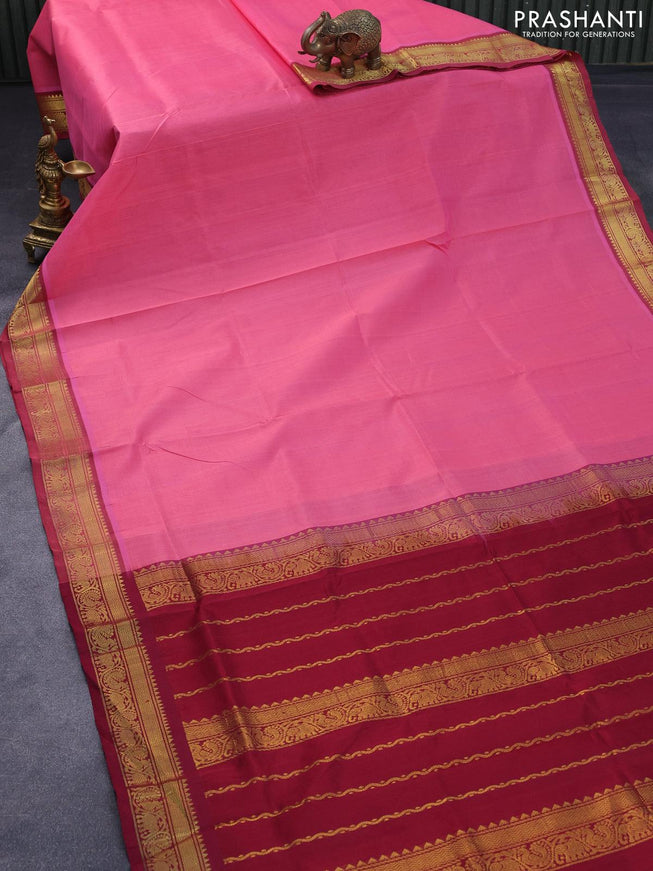 Silk cotton saree candy pink and maroon with plain body and zari woven border