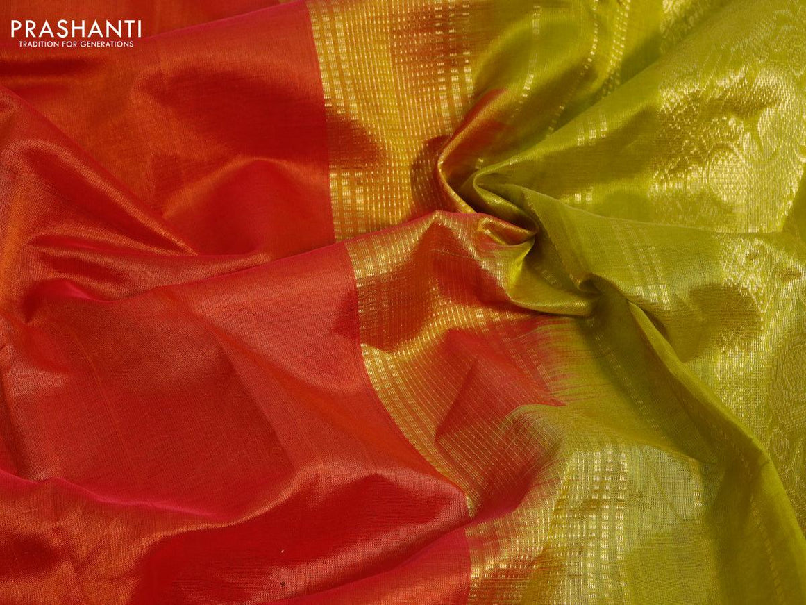 Silk cotton saree sunset orange and light green with plain body and annam zari woven border