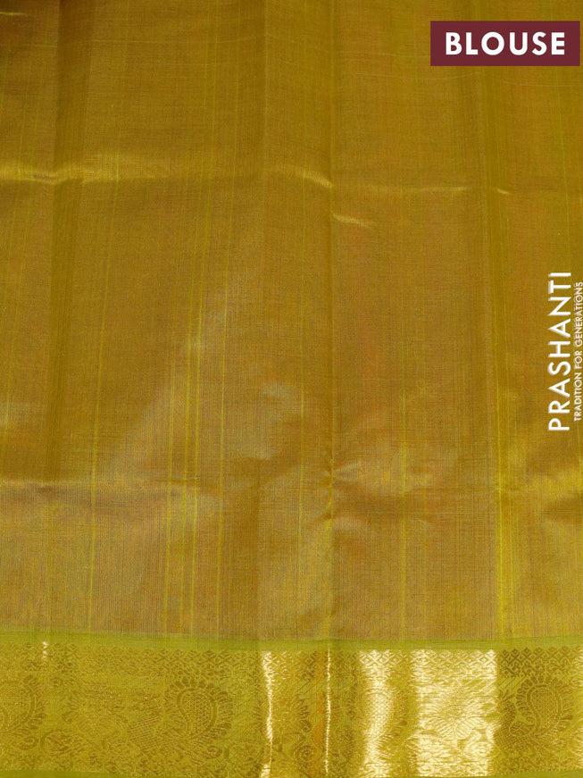 Silk cotton saree sunset orange and light green with plain body and annam zari woven border