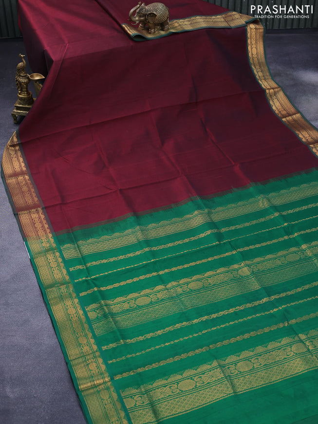 Silk cotton saree deep maroon and green with plain body and zari woven border