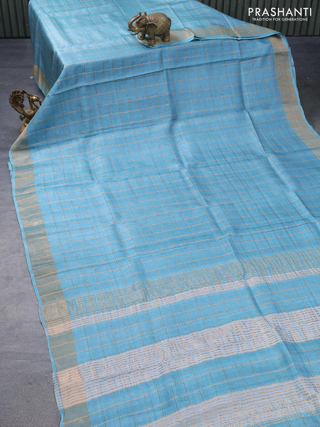 Pure tussar silk saree light blue and rust shade with allover zari checked pattern and zari woven border - kalamkari printed blouse