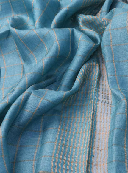 Pure tussar silk saree light blue and rust shade with allover zari checked pattern and zari woven border - kalamkari printed blouse