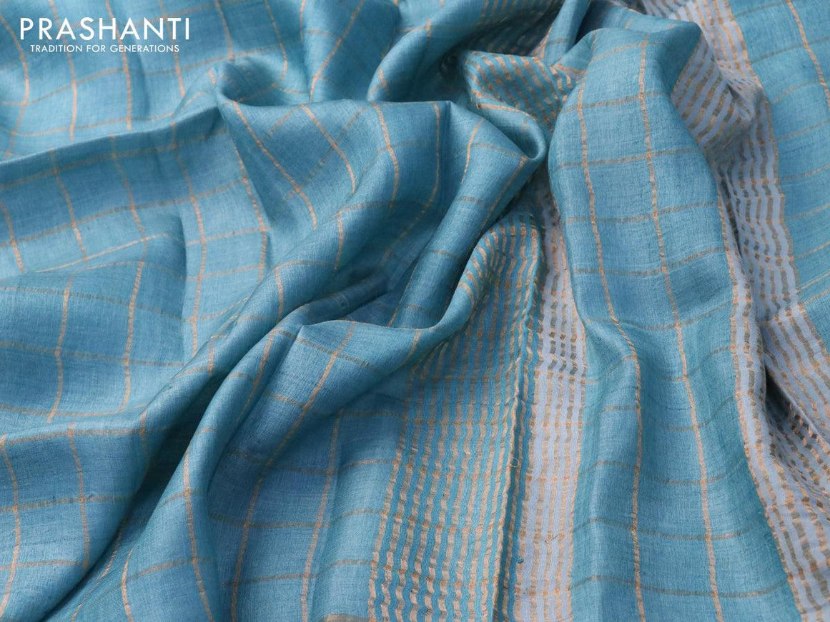 Pure tussar silk saree light blue and rust shade with allover zari checked pattern and zari woven border - kalamkari printed blouse