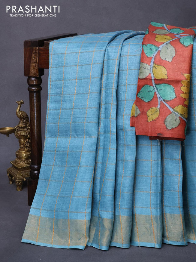 Pure tussar silk saree light blue and rust shade with allover zari checked pattern and zari woven border - kalamkari printed blouse