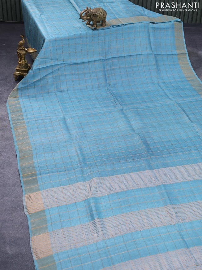 Pure tussar silk saree light blue and rust shade with allover zari checked pattern and zari woven border - kalamkari printed blouse