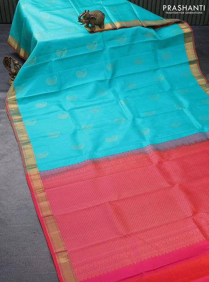 Pure kanjivaram silk saree teal blue and dual shade of pinkish orange with paisley zari woven buttas and zari woven border