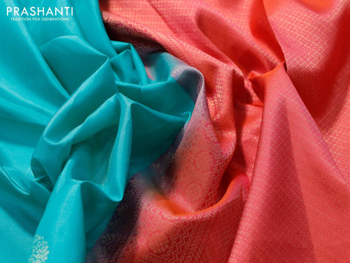 Pure kanjivaram silk saree teal blue and dual shade of pinkish orange with paisley zari woven buttas and zari woven border