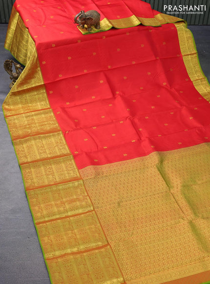 Pure kanjivaram silk saree red and light green with allover self emoss & zari buttas and long zari woven border