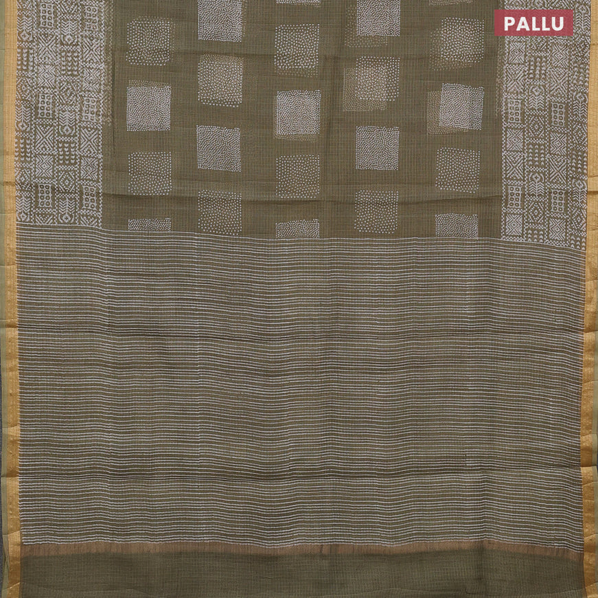 Kota saree sap green shade with allover geometric butta prints and zari woven border