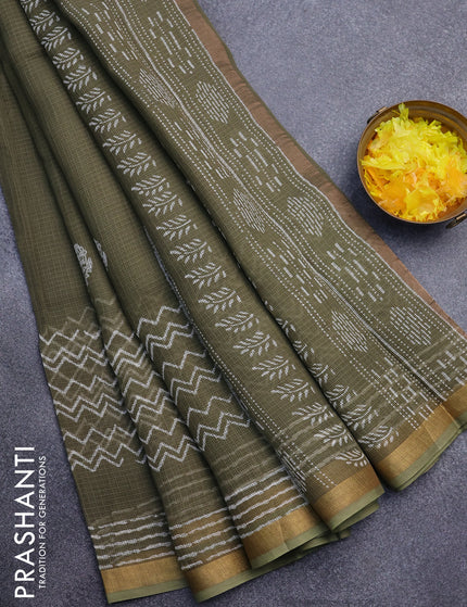 Kota saree dark sap green with floral butta prints and zari woven border