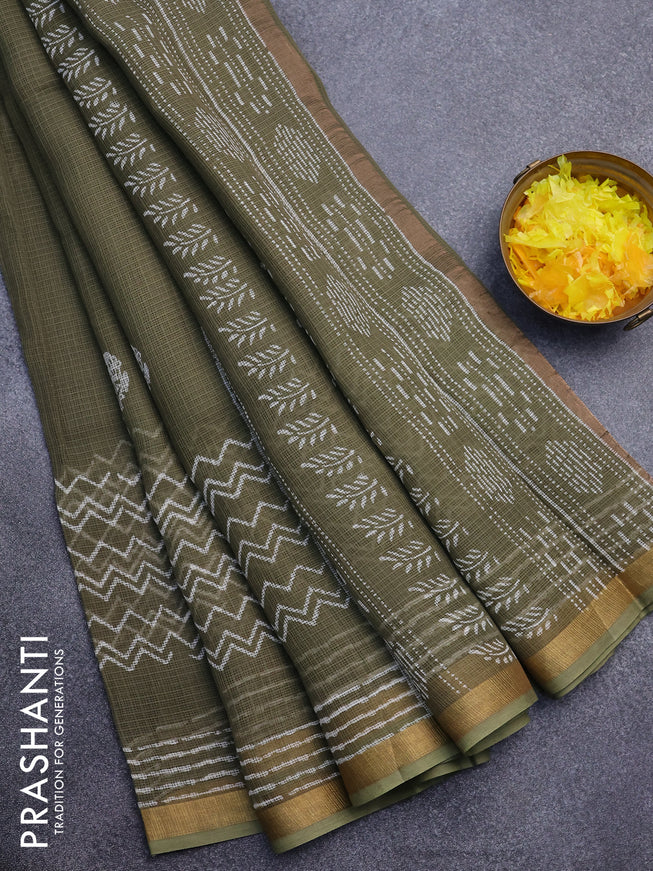 Kota saree dark sap green with floral butta prints and zari woven border