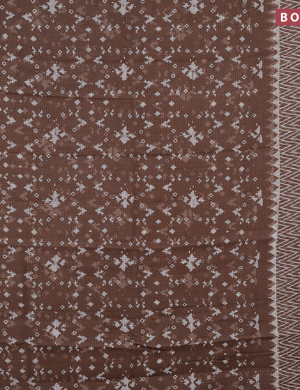 Kota saree brown shade with allover prints and zari woven border