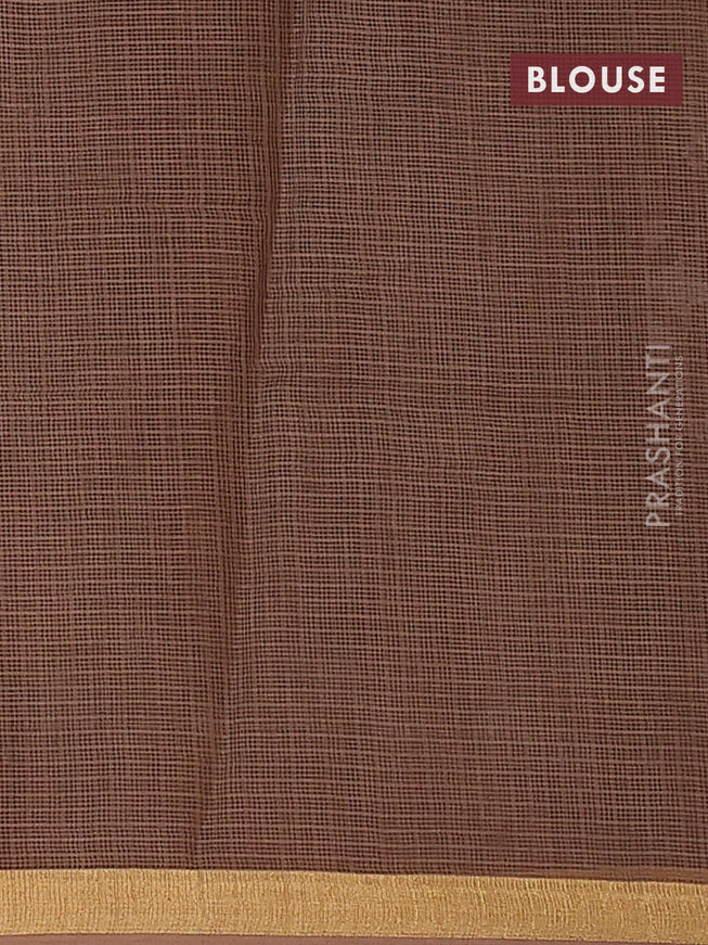 Kota saree brown shade with allover prints and zari woven border