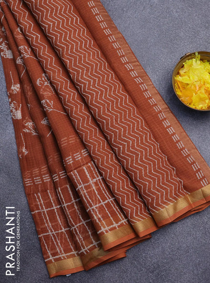 Kota saree rust shade with allover leaf butta prints and zari woven border