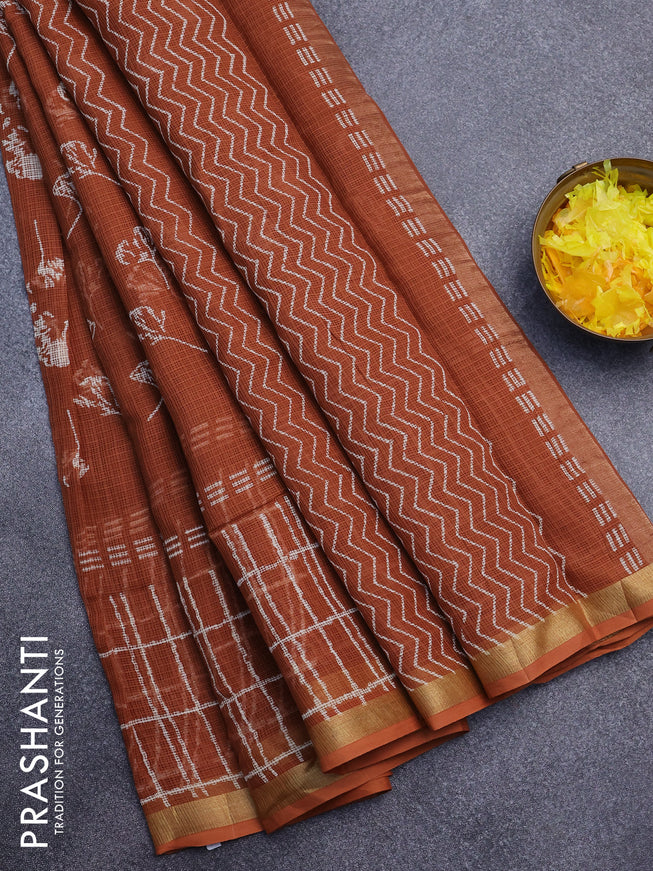 Kota saree rust shade with allover leaf butta prints and zari woven border