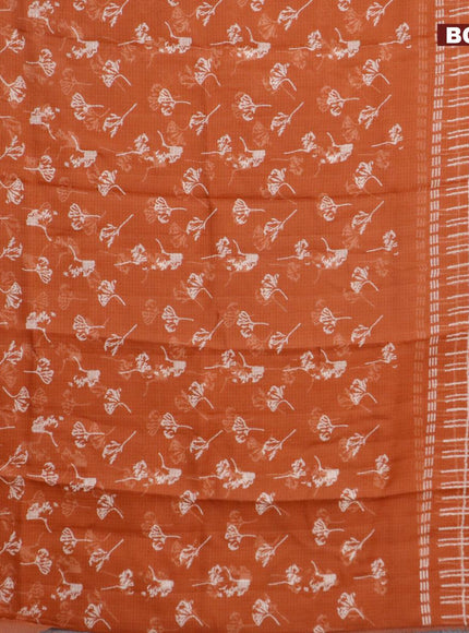 Kota saree rust shade with allover leaf butta prints and zari woven border