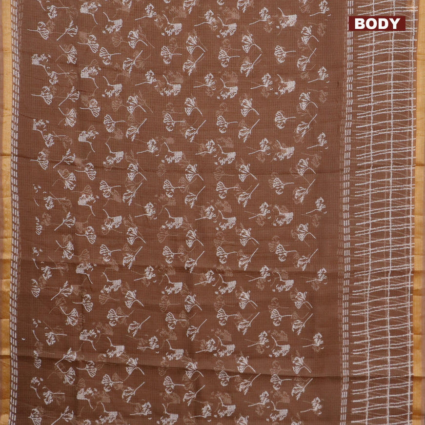 Kota saree brown shade with allover leaf butta prints and zari woven border