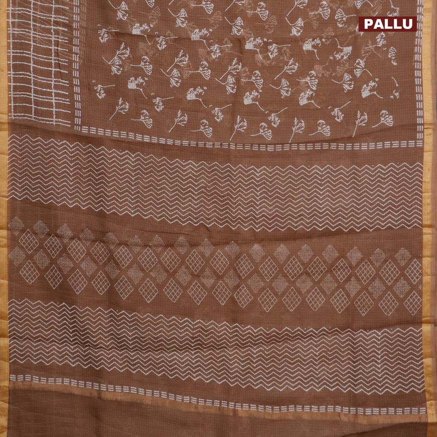 Kota saree brown shade with allover leaf butta prints and zari woven border