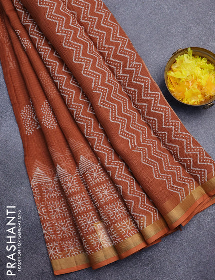 Kota saree rust shade with tree butta prints and zari woven border