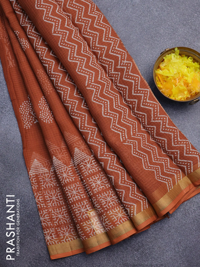 Kota saree rust shade with tree butta prints and zari woven border