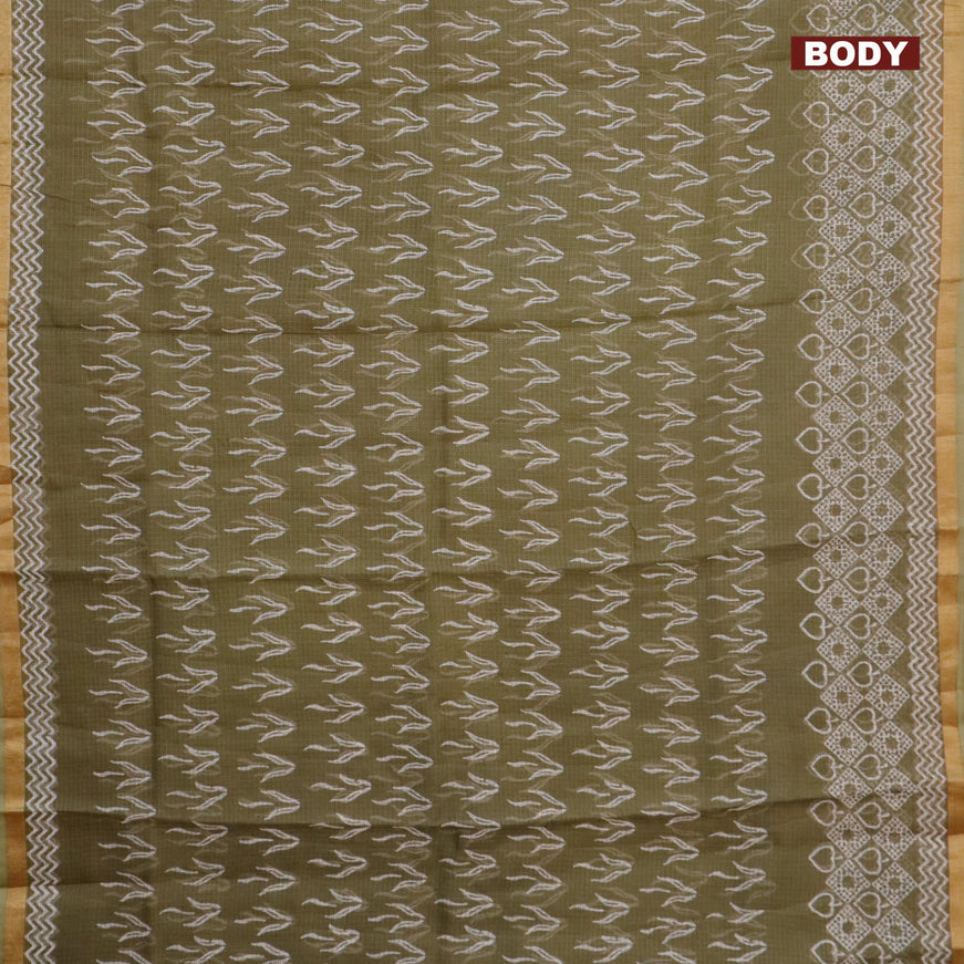 Kota saree sap green shade with allover butta prints and zari woven border