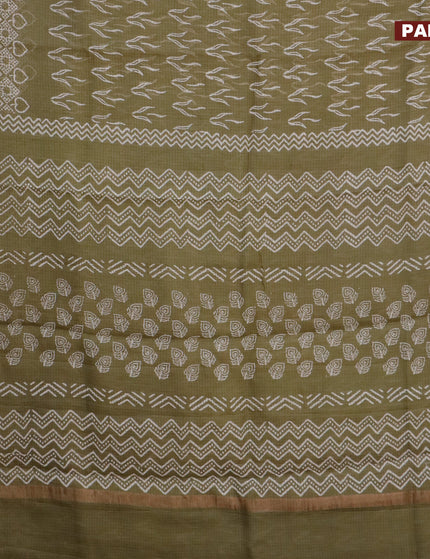 Kota saree sap green shade with allover butta prints and zari woven border