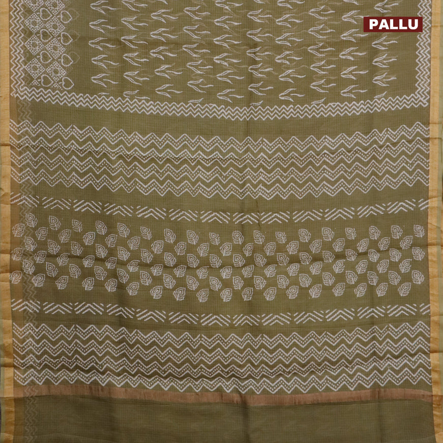 Kota saree sap green shade with allover butta prints and zari woven border