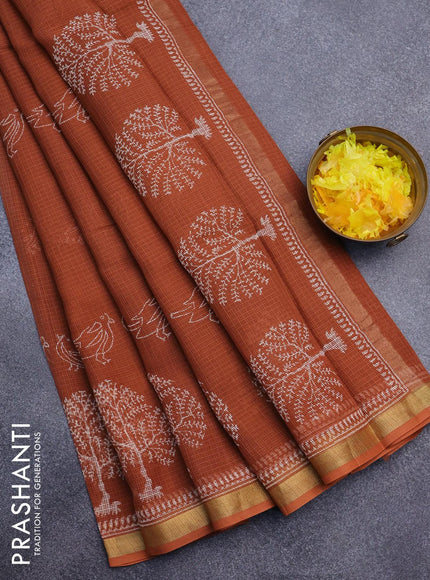 Kota saree rust shade with butta prints and zari woven border